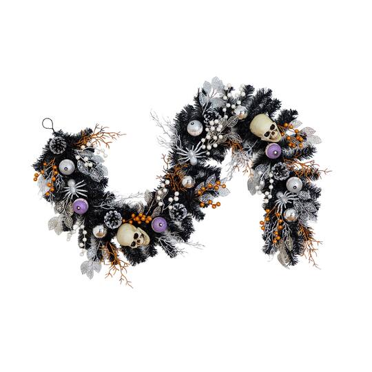 6ft. Artificial Halloween Black Garland with Skulls, Eyeballs & Spiders